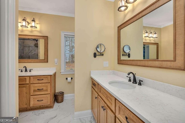 full bathroom featuring crown molding, marble finish floor, two vanities, and a sink