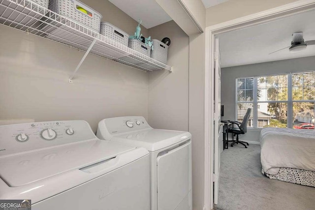 laundry room featuring washer and dryer and carpet flooring