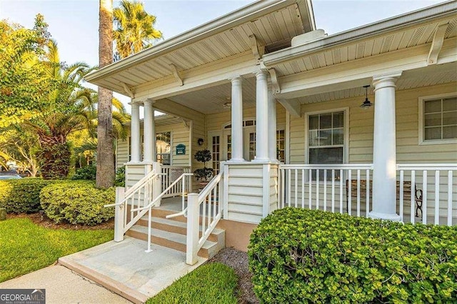 entrance to property featuring covered porch