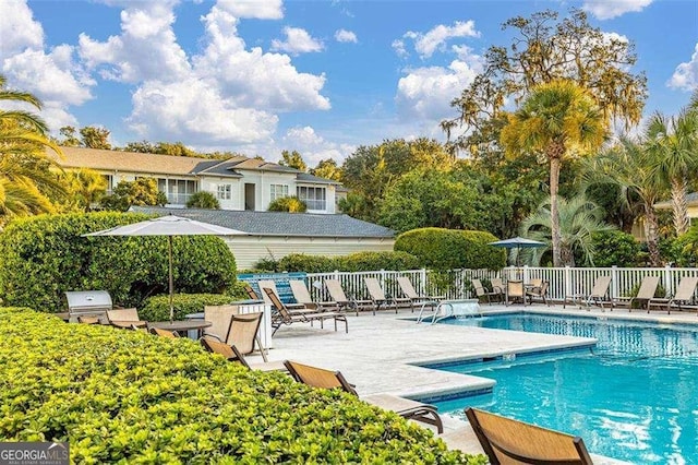 1704 Frederica Rd Unit 325, Saint Simons, GA 31522 - community pool with a patio area and grilling area