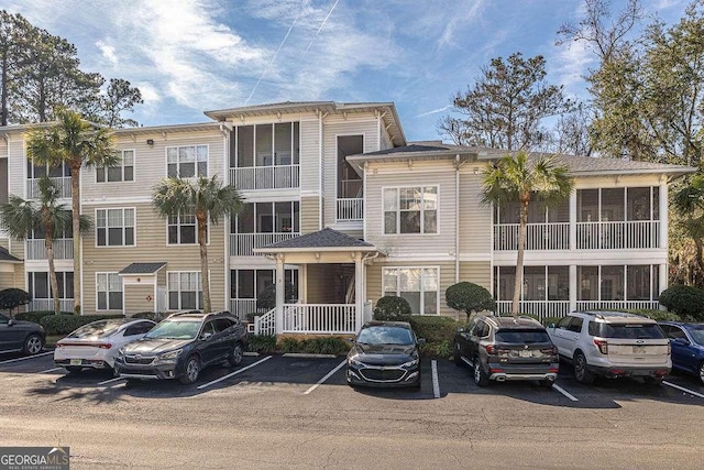 1704 Frederica Rd Unit 325, Saint Simons, GA 31522 - view of property with uncovered parking