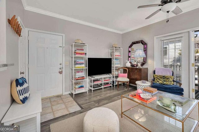 1704 Frederica Rd Unit 325, Saint Simons, GA 31522 - living room featuring ornamental molding, ceiling fan, wood finished floors, and baseboards