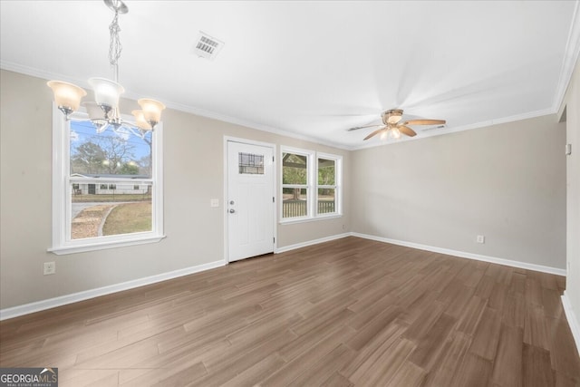 2923 Hall Dr SE, Smyrna, GA 30082 - interior space with baseboards, ceiling fan with notable chandelier, wood finished floors, and visible vents