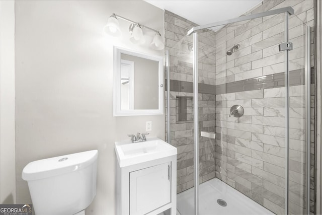 2923 Hall Dr SE, Smyrna, GA 30082 - bathroom with vanity, a stall shower, and toilet