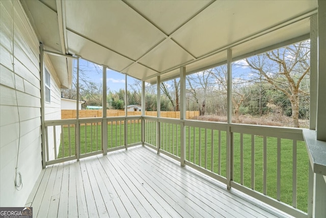 unfurnished sunroom featuring a wealth of natural light