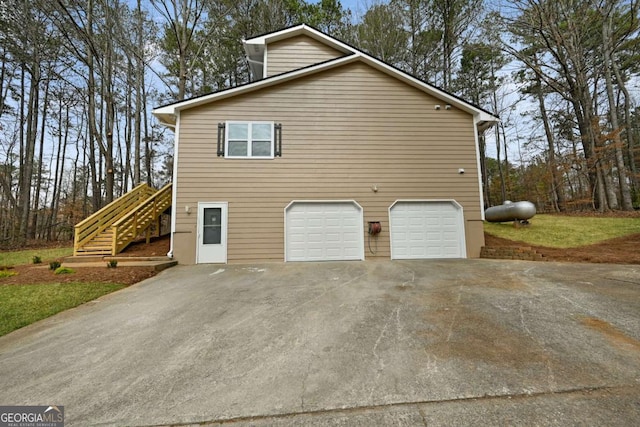 view of home's exterior with a garage