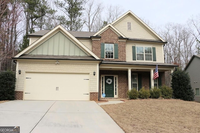 craftsman-style home with a porch and a garage