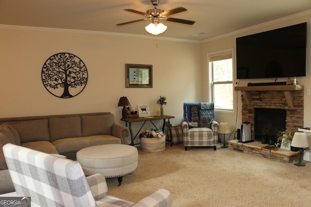 carpeted living room featuring a fireplace, ornamental molding, and ceiling fan