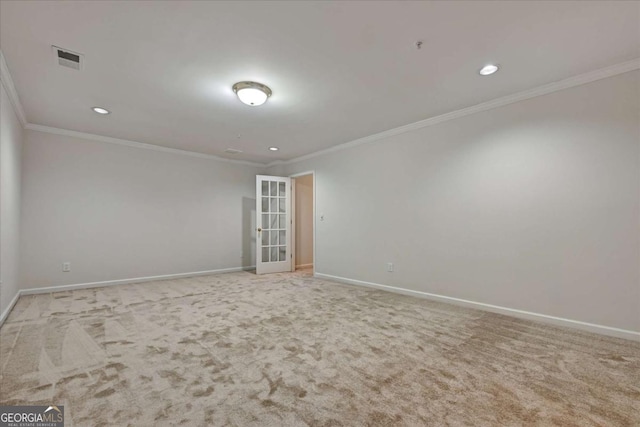 carpeted empty room with ornamental molding