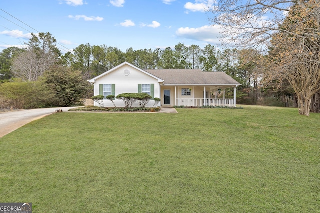 single story home with covered porch and a front lawn