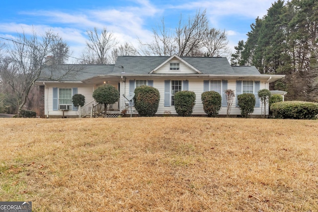 ranch-style house with a front lawn