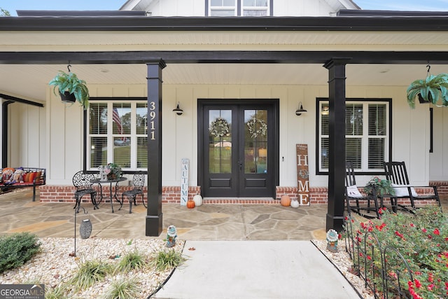 entrance to property with french doors and covered porch