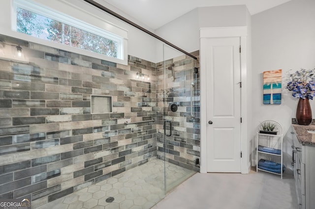 bathroom with vanity and walk in shower