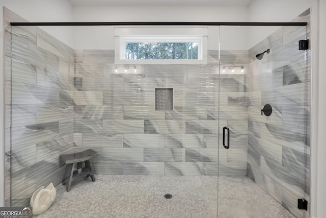 bathroom featuring an enclosed shower