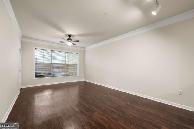 unfurnished room featuring crown molding, dark wood-type flooring, and ceiling fan