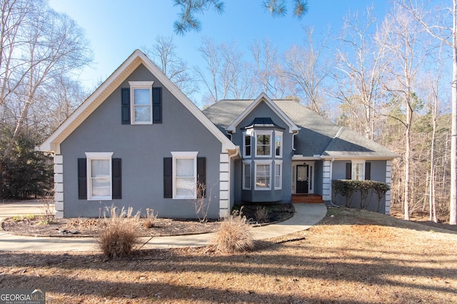 view of front of home featuring stucco siding