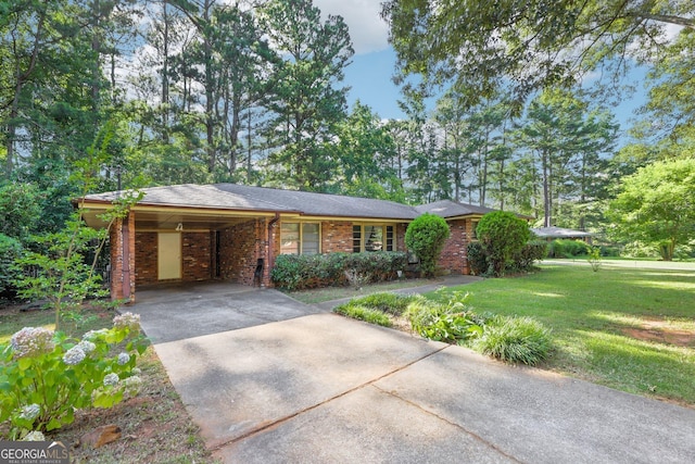 ranch-style home with a carport and a front lawn