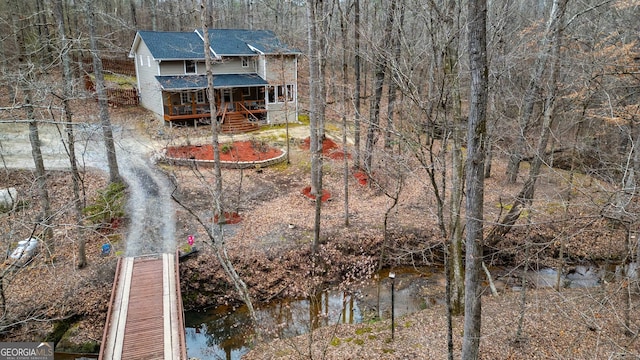 bird's eye view featuring a view of trees