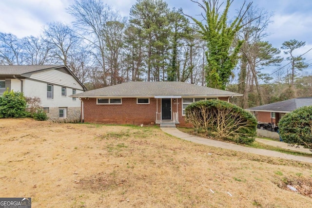 view of front of home with a front lawn