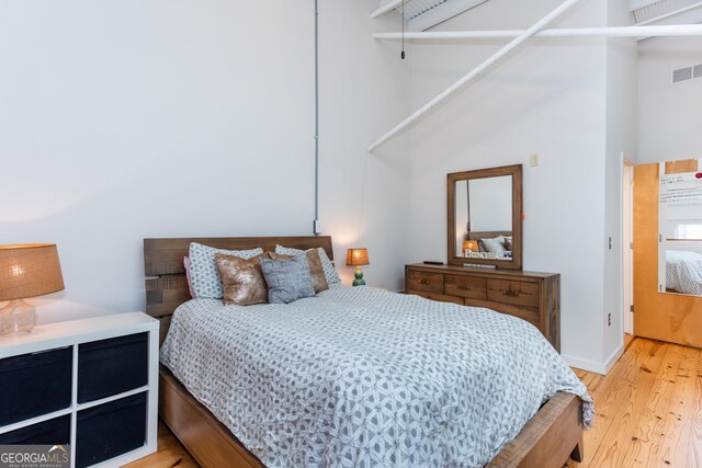 1661 La France St NE Unit 216, Atlanta, GA 30307 - bedroom with light wood-style floors