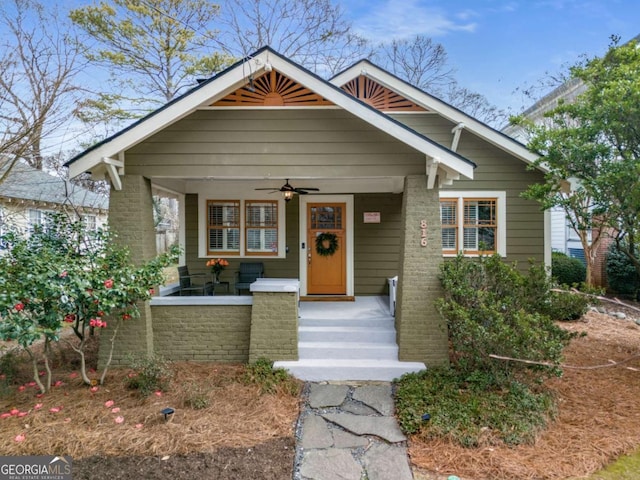 bungalow with ceiling fan and a porch