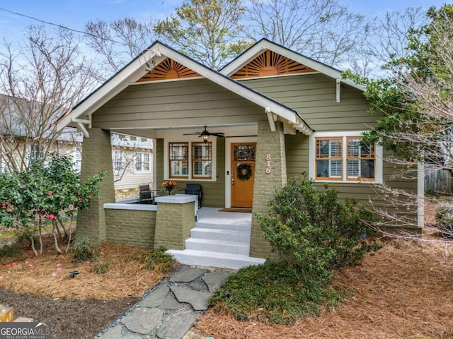 view of front of home featuring a porch and ceiling fan