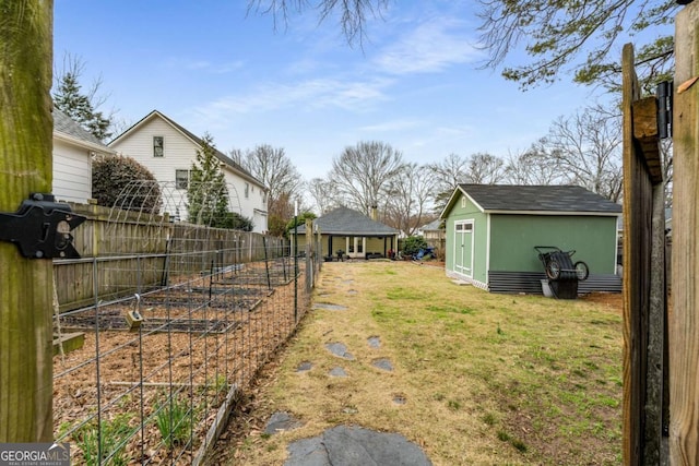 view of yard featuring a gazebo and an outdoor structure