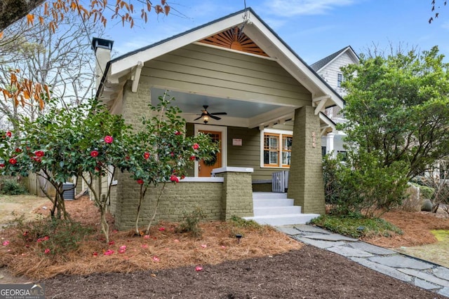 view of front facade featuring ceiling fan and a porch