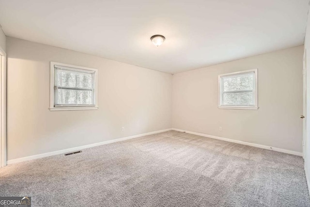 empty room with carpet floors