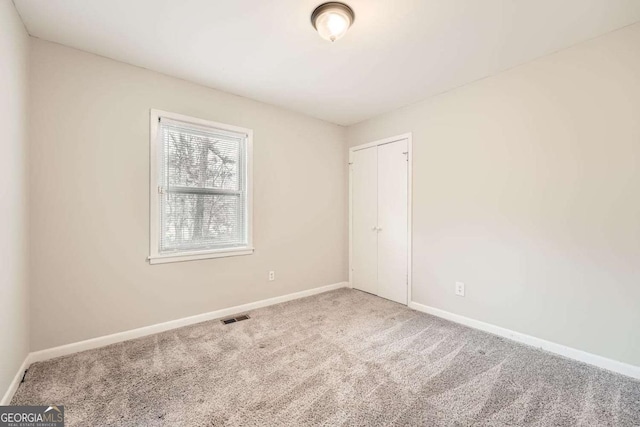 view of carpeted spare room