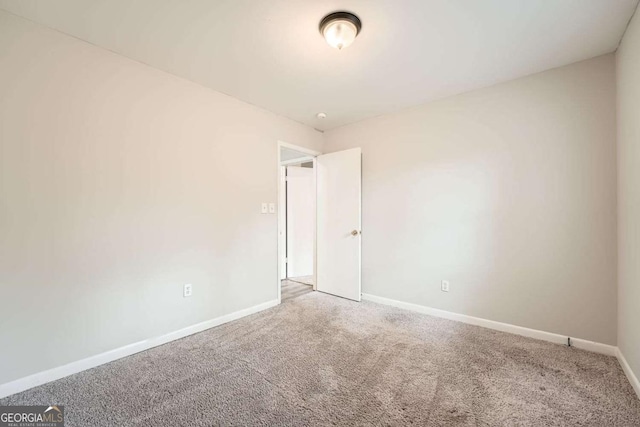 view of carpeted spare room