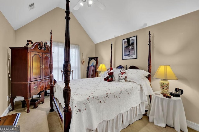 bedroom featuring lofted ceiling, light carpet, and ceiling fan