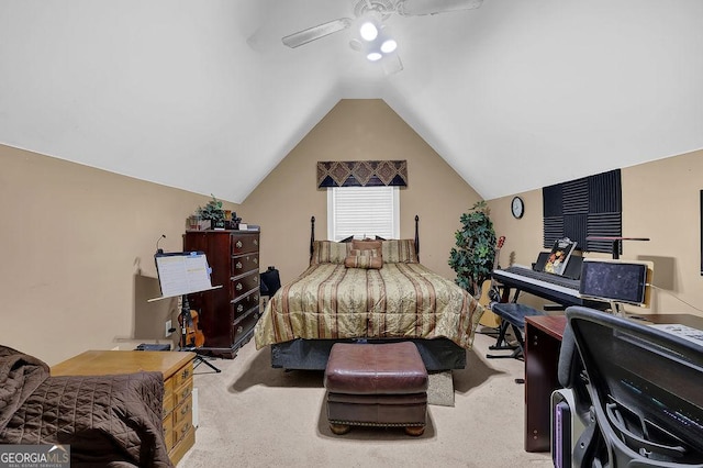 carpeted bedroom featuring lofted ceiling and ceiling fan