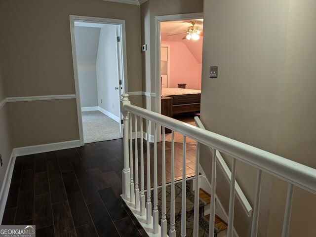 corridor with dark wood-type flooring