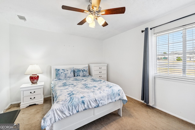 1625 Conley Rd Unit 270, Conley, GA 30288 - carpeted bedroom with baseboards and ceiling fan