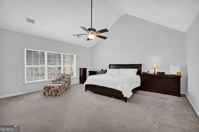 carpeted bedroom featuring ceiling fan and high vaulted ceiling