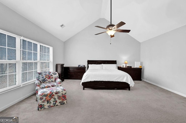 carpeted bedroom with lofted ceiling and ceiling fan