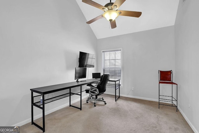 office area with ceiling fan, light carpet, and high vaulted ceiling