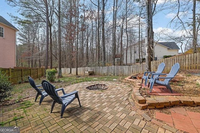 view of patio featuring an outdoor fire pit