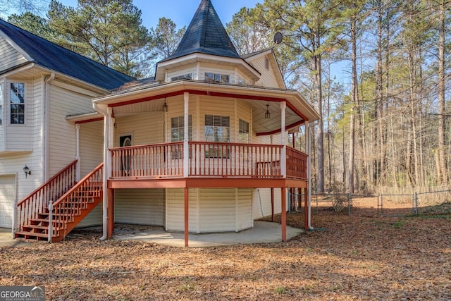 back of property featuring a patio area