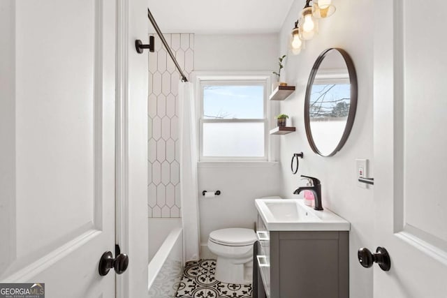 full bathroom with vanity, shower / bathtub combination with curtain, tile patterned floors, and toilet