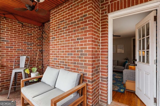 view of patio featuring ceiling fan