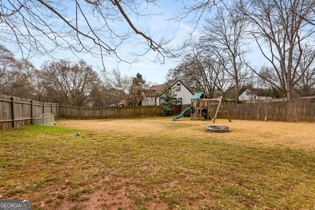 view of yard featuring a playground