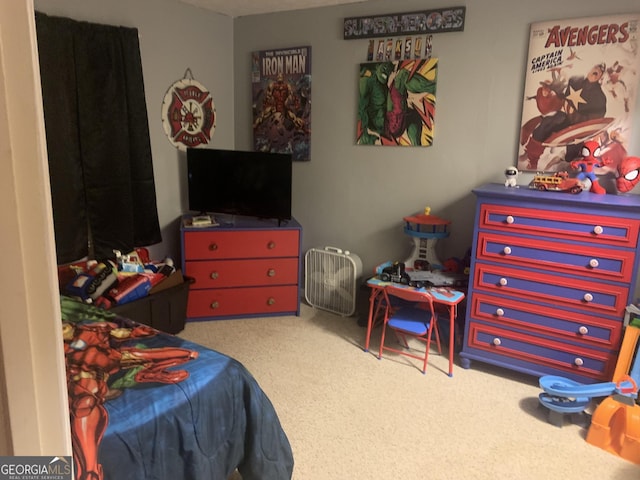 bedroom featuring carpet