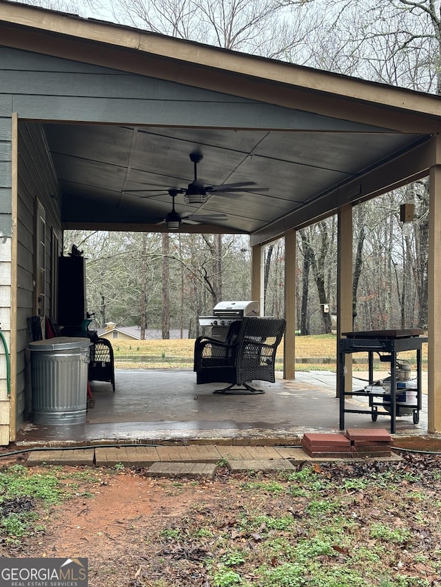 exterior space with ceiling fan