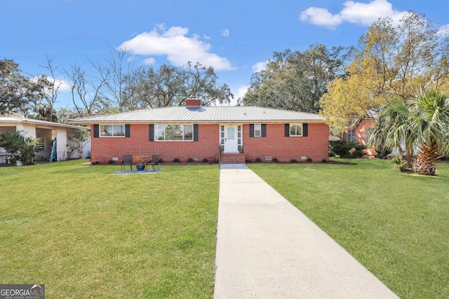 ranch-style house featuring a front lawn