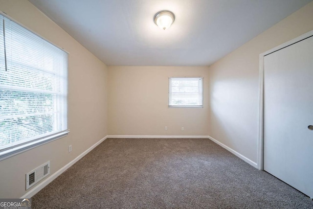 view of carpeted spare room