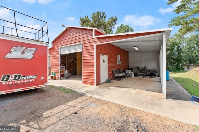 garage featuring a carport