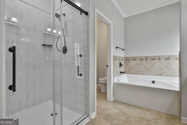 full bath featuring a garden tub, toilet, ornamental molding, a stall shower, and tile patterned flooring