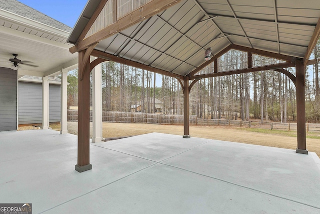 view of patio featuring a fenced backyard and a ceiling fan